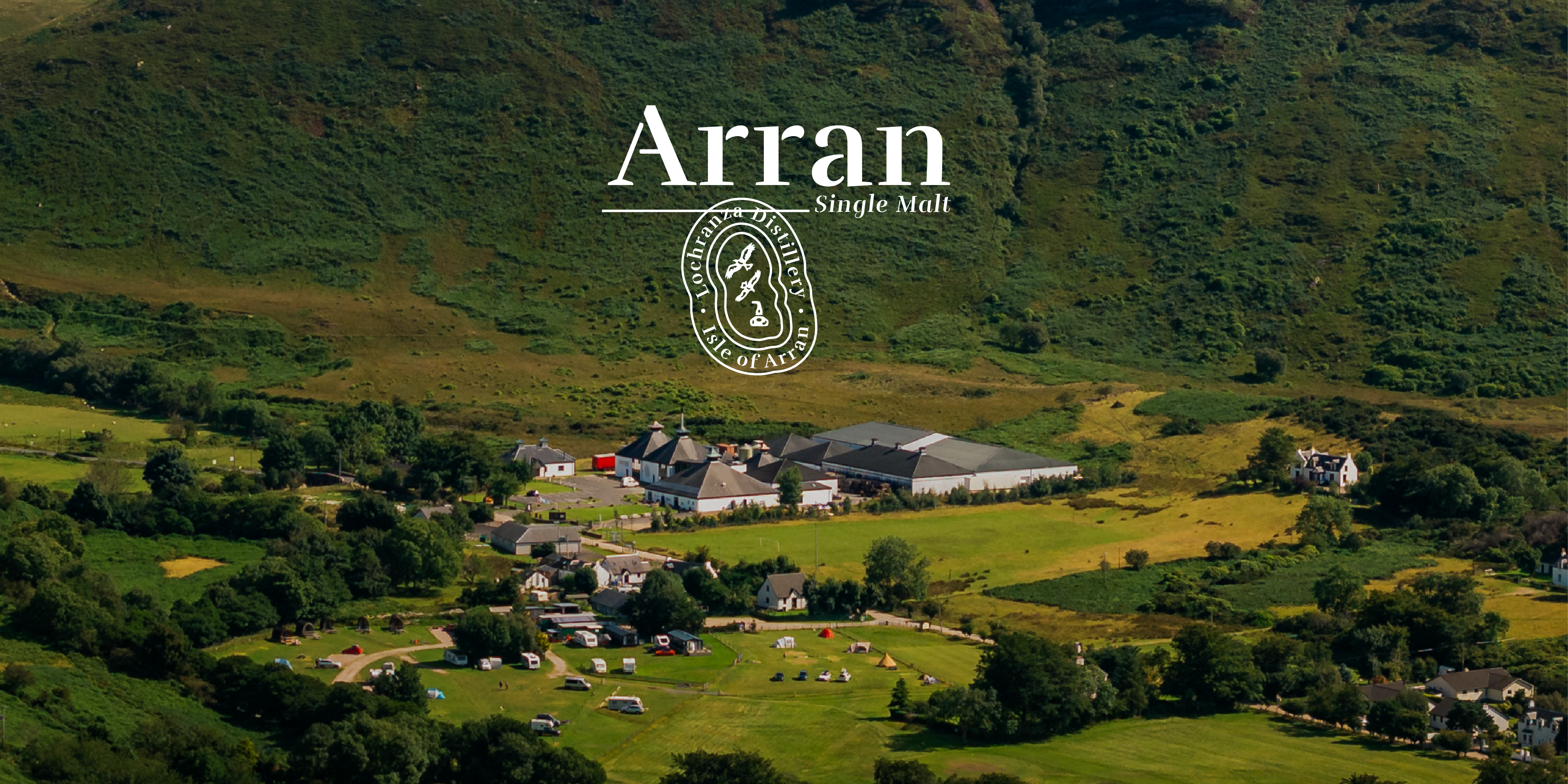Arran distillery surrounded by green hills with Arran logo overlay